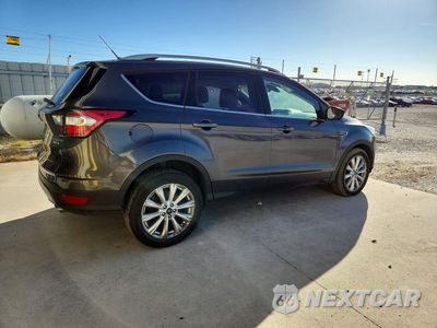 Trzecie zdjęcie samochodu z tyłu: 2017 FORD ESCAPE TITANIUM VIN:1FMCU9JD2HUC26323 - miniatura