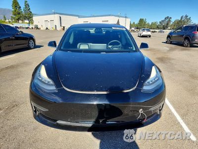 Piąte zdjęcie samochodu w środku: 2018 TESLA MODEL 3 VIN:5YJ3E1EB2JF179837 - miniatura