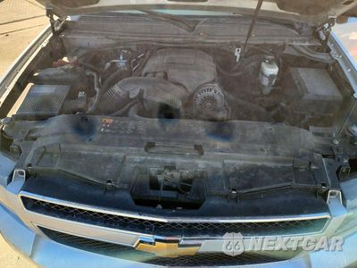 Zdjęcie 12 z 13 samochodu: 2012 CHEVROLET TAHOE K1500 LS VIN:1GNSKAE00CR233479 - miniatura