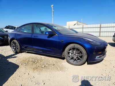 Czwarte zdjęcie samochodu z boku: 2021 TESLA MODEL 3 VIN:5YJ3E1EB9MF066942 - miniatura