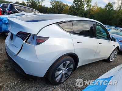 Trzecie zdjęcie samochodu z tyłu: 2021 TESLA MODEL Y VIN:5YJYGDEE3MF191964 - miniatura