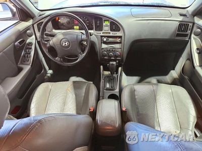 Zdjęcie 8 z 12 samochodu: 2004 HYUNDAI ELANTRA GT VIN:KMHDN56D74U126988 - miniatura