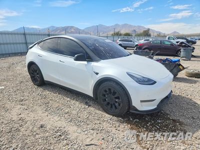 Czwarte zdjęcie samochodu z boku: 2022 TESLA MODEL Y VIN:7SAYGDEE7NF481516 - miniatura