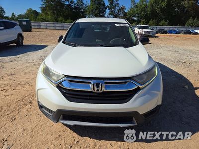 Piąte zdjęcie samochodu w środku: 2017 HONDA CR-V LX VIN:2HKRW5H35HH400913 - miniatura