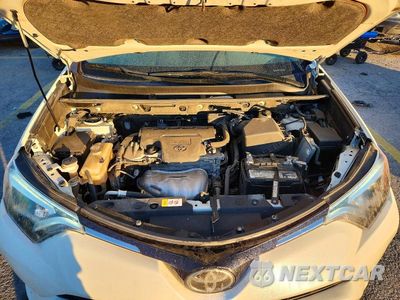 Zdjęcie 12 z 14 samochodu: 2018 TOYOTA RAV4 LIMITED VIN:JTMYFREVXJJ169769 - miniatura
