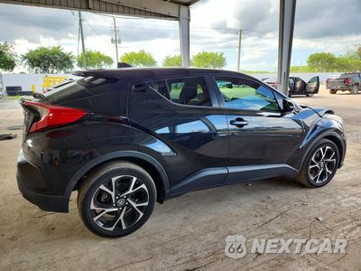 Trzecie zdjęcie samochodu z tyłu: 2021 TOYOTA C-HR XLE VIN:NMTKHMBX0MR122684 - miniatura
