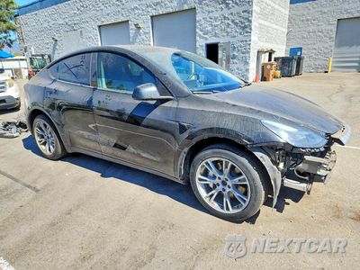 Czwarte zdjęcie samochodu z boku: 2023 TESLA MODEL Y VIN:7SAYGDEE0PA212869 - miniatura
