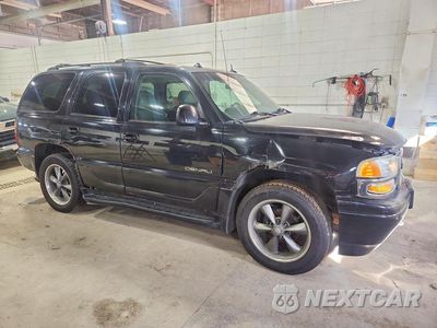 Czwarte zdjęcie samochodu z boku: 2003 GMC YUKON DENALI VIN:1GKEK63UX3J271734 - miniatura