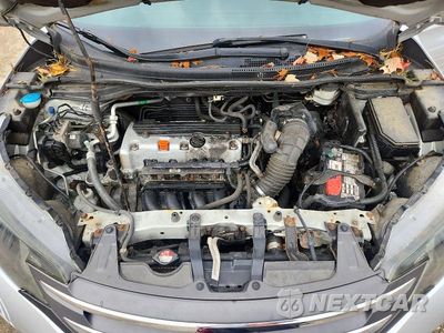 Zdjęcie 12 z 13 samochodu: 2012 HONDA CR-V LX VIN:2HKRM4H32CH618123 - miniatura