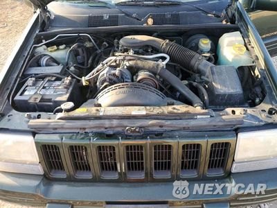 Zdjęcie 12 z 13 samochodu: 1997 JEEP GRAND CHEROKEE LIMITED VIN:1J4GZ78YXVC563693 - miniatura