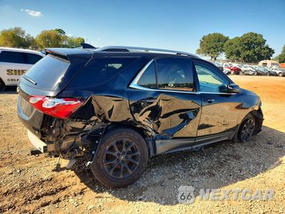 Trzecie zdjęcie samochodu z tyłu: 2018 CHEVROLET EQUINOX LT VIN:2GNAXJEV4J6330704 - miniatura