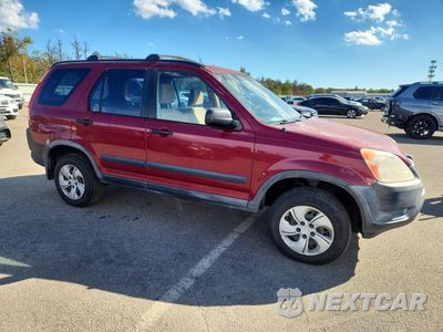 Czwarte zdjęcie samochodu z boku: 2004 HONDA CR-V LX VIN:JHLRD684X4C020673 - miniatura
