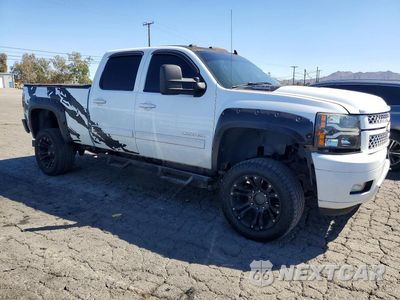 Czwarte zdjęcie samochodu z boku: 2013 CHEVROLET SILVERADO K2500 HEAVY DUTY LTZ VIN:1GC1KYC85DF237374 - miniatura