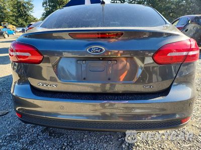 Zdjęcie 6 z 12 samochodu: 2017 FORD FOCUS SEL VIN:1FADP3H22HL248982 - miniatura