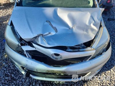 Zdjęcie 11 z 12 samochodu: 2013 TOYOTA YARIS 5-DOOR L VIN:JTDKTUD39DD564045 - miniatura