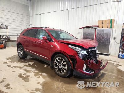 Czwarte zdjęcie samochodu z boku: 2021 CADILLAC XT5 SPORT VIN:1GYKNGRS8MZ155253 - miniatura