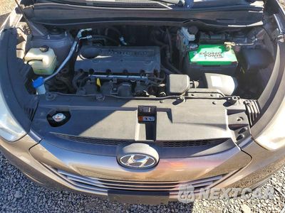 Zdjęcie 12 z 14 samochodu: 2013 HYUNDAI TUCSON GLS VIN:KM8JUCAC3DU618619 - miniatura