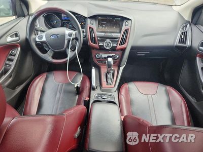 Zdjęcie 8 z 12 samochodu: 2013 FORD FOCUS TITANIUM VIN:1FADP3J23DL249675 - miniatura