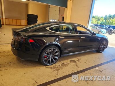 Trzecie zdjęcie samochodu z tyłu: 2014 TESLA MODEL S VIN:5YJSA1H10EFP55778 - miniatura
