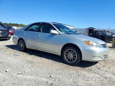 Czwarte zdjęcie samochodu z boku: 2003 TOYOTA CAMRY XLE V6 VIN:4T1BF30K53U564441 - miniatura
