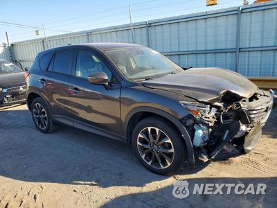 Czwarte zdjęcie samochodu z boku: 2016 MAZDA CX-5 GT VIN:JM3KE4DY1G0916401 - miniatura