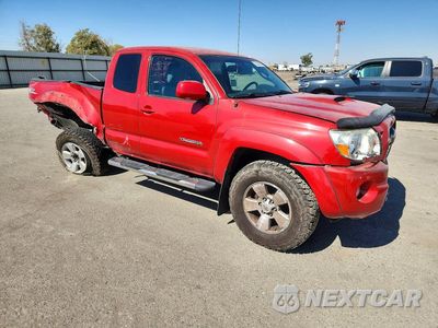 Czwarte zdjęcie samochodu z boku: 2011 TOYOTA TACOMA V6 VIN:5TFUU4EN0BX008031 - miniatura