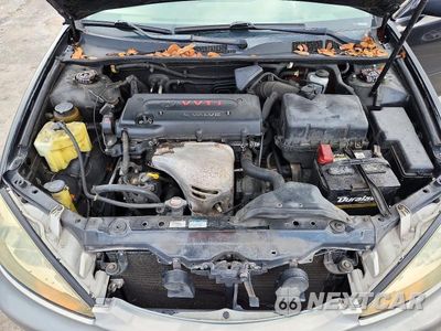 Zdjęcie 11 z 12 samochodu: 2004 TOYOTA CAMRY LE VIN:4T1BE32K54U333329 - miniatura