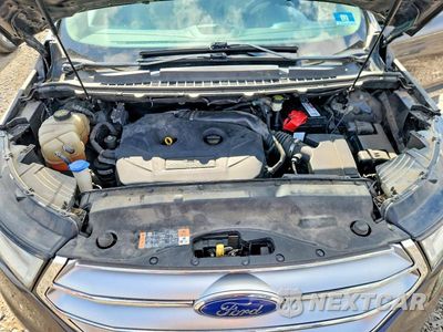 Zdjęcie 12 z 13 samochodu: 2015 FORD EDGE SEL VIN:2FMTK4J97FBB32106 - miniatura