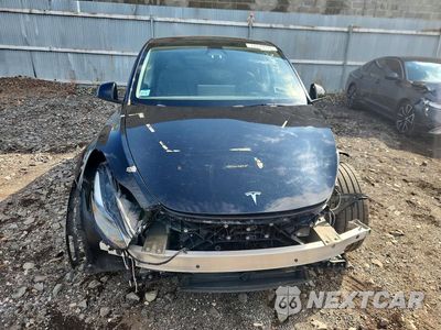 Piąte zdjęcie samochodu w środku: 2023 TESLA MODEL Y VIN:7SAYGAEE2PF921238 - miniatura