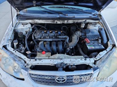 Zdjęcie 11 z 12 samochodu: 2004 TOYOTA COROLLA LE VIN:JTDBR32E942017298 - miniatura