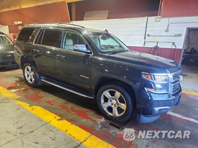 Czwarte zdjęcie samochodu z boku: 2016 CHEVROLET TAHOE K1500 LTZ VIN:1GNSKCKC8GR330039 - miniatura