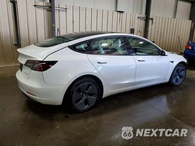 Trzecie zdjęcie samochodu z tyłu: 2022 TESLA MODEL 3 VIN:5YJ3E1EB9NF362092 - miniatura