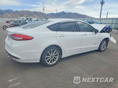 Trzecie zdjęcie samochodu z tyłu: 2017 FORD FUSION SE HYBRID VIN:3FA6P0LU9HR222624 - miniatura