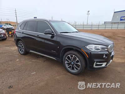 Czwarte zdjęcie samochodu z boku: 2018 BMW X5 XDR40E VIN:5UXKT0C56J0V98604 - miniatura