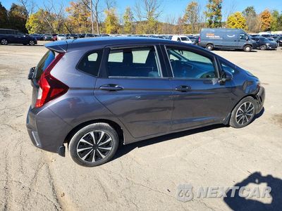 Trzecie zdjęcie samochodu z tyłu: 2015 HONDA FIT LX VIN:3HGGK5H59FM770856 - miniatura