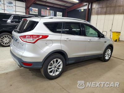 Trzecie zdjęcie samochodu z tyłu: 2016 FORD ESCAPE TITANIUM VIN:1FMCU9JX9GUB42671 - miniatura