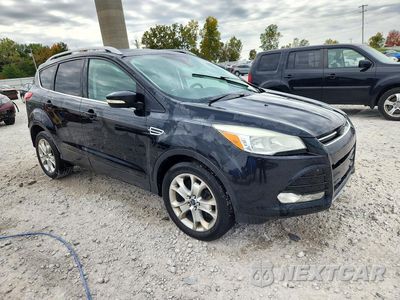 Czwarte zdjęcie samochodu z boku: 2014 FORD ESCAPE TITANIUM VIN:1FMCU0J91EUC78092 - miniatura