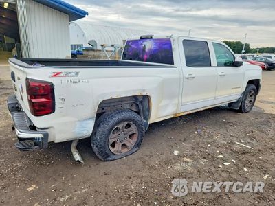 Trzecie zdjęcie samochodu z tyłu: 2016 CHEVROLET SILVERADO K1500 LT VIN:3GCUKREC7GG104204 - miniatura