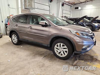 Czwarte zdjęcie samochodu z boku: 2016 HONDA CR-V EX VIN:5J6RM4H5XGL063113 - miniatura