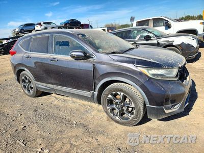 Czwarte zdjęcie samochodu z boku: 2017 HONDA CR-V TOURING VIN:2HKRW1H91HH503369 - miniatura