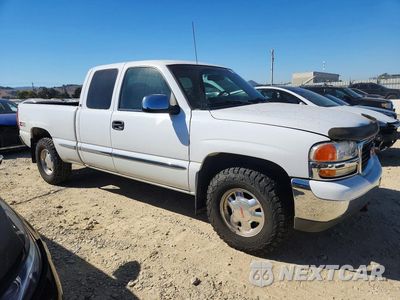 Czwarte zdjęcie samochodu z boku: 2001 GMC NEW SIERRA K1500 VIN:1GTEK19T61E324576 - miniatura