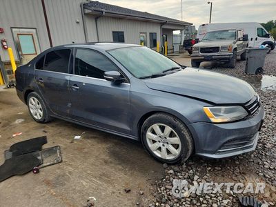 Czwarte zdjęcie samochodu z boku: 2015 VOLKSWAGEN JETTA TDI VIN:3VWLA7AJ4FM323772 - miniatura