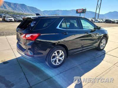 Trzecie zdjęcie samochodu z tyłu: 2018 CHEVROLET EQUINOX LT VIN:2GNAXJEV0J6307632 - miniatura