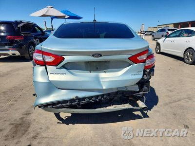 Zdjęcie 6 z 12 samochodu: 2014 FORD FUSION SE HYBRID VIN:3FA6P0LU0ER157156 - miniatura