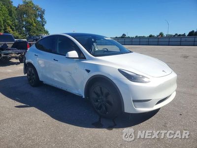 Czwarte zdjęcie samochodu z boku: 2024 TESLA MODEL Y VIN:7SAYGDED4RA319756 - miniatura