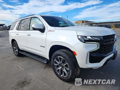 Czwarte zdjęcie samochodu z boku: 2024 CHEVROLET TAHOE K1500 Z71 VIN:1GNSKPKD3RR328105 - miniatura