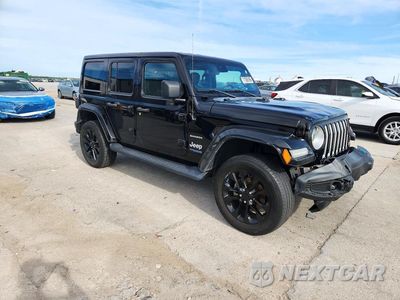 Czwarte zdjęcie samochodu z boku: 2022 JEEP WRANGLER UNLIMITED SAHARA 4XE VIN:1C4JJXP67NW277575 - miniatura
