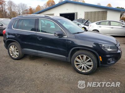 Czwarte zdjęcie samochodu z boku: 2013 VOLKSWAGEN TIGUAN S VIN:WVGBV3AX5DW562482 - miniatura