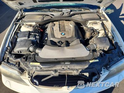 Zdjęcie 11 z 12 samochodu: 2008 BMW 750 I VIN:WBAHL83548DT11979 - miniatura