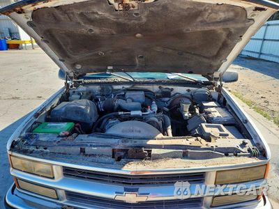 Zdjęcie 12 z 13 samochodu: 2001 CHEVROLET SUBURBAN C1500 VIN:1GNEC16R1TJ332219 - miniatura